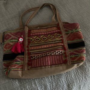 America and beyond tote bag